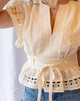 Noemi Eyelet Trim Peplum Top