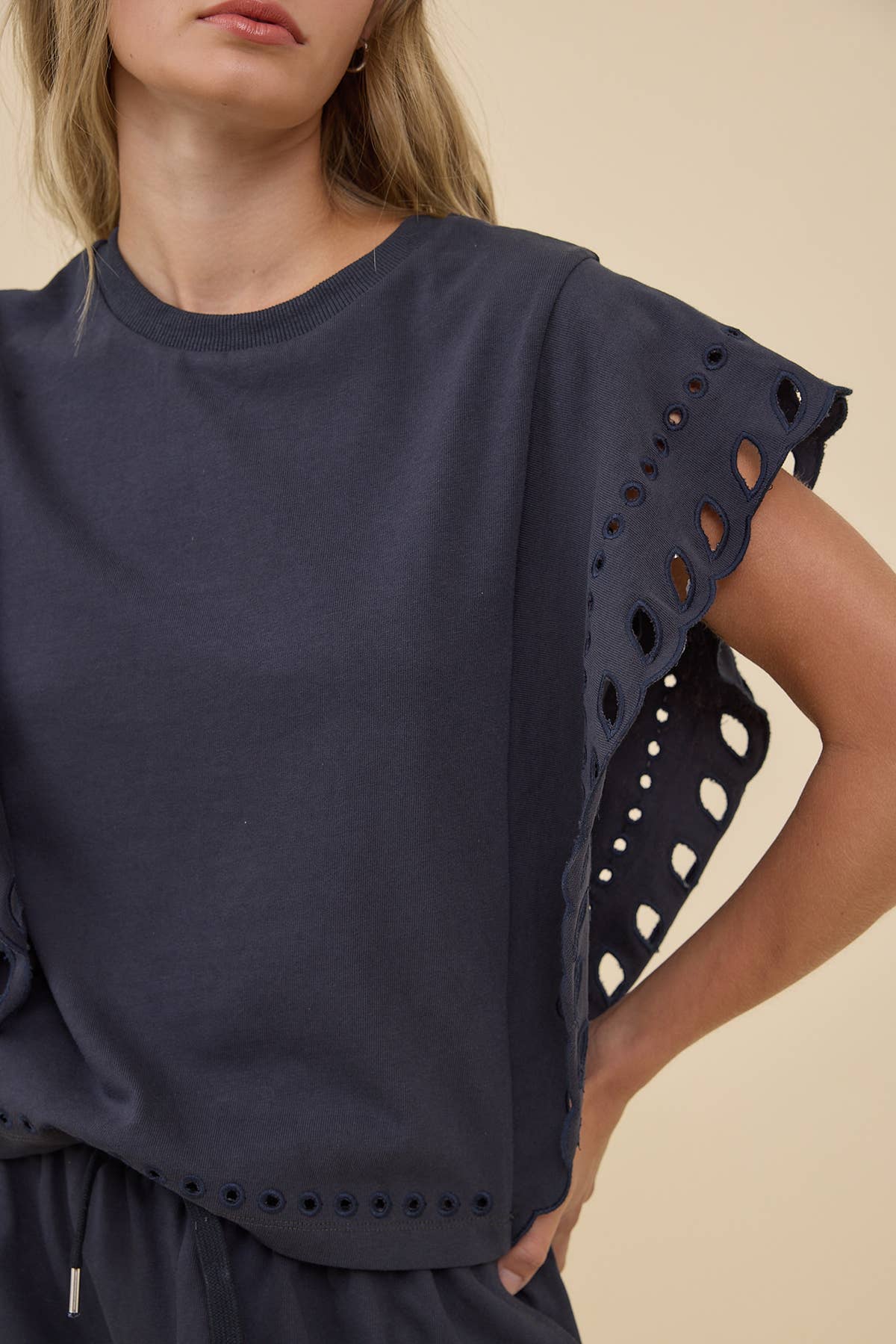 Poppy Eyelet Flutter Sleeve Top