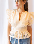 Noemi Eyelet Trim Peplum Top