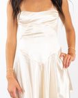 Lucy in the Sky Satin V-Drop Waist Dress in Champagne